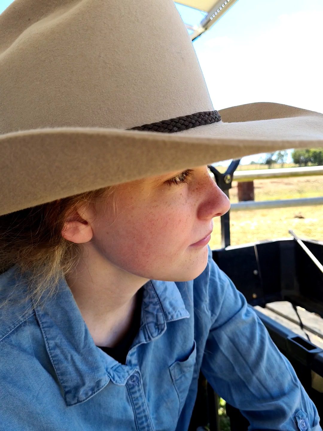 Summer wearing a cowboy hat